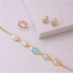 PULSEIRA COM PEDRA DA LUA, QUARTZO ROSA E AGATA AZUL CÉU - BANHADA A OURO 18K (PL110.D)