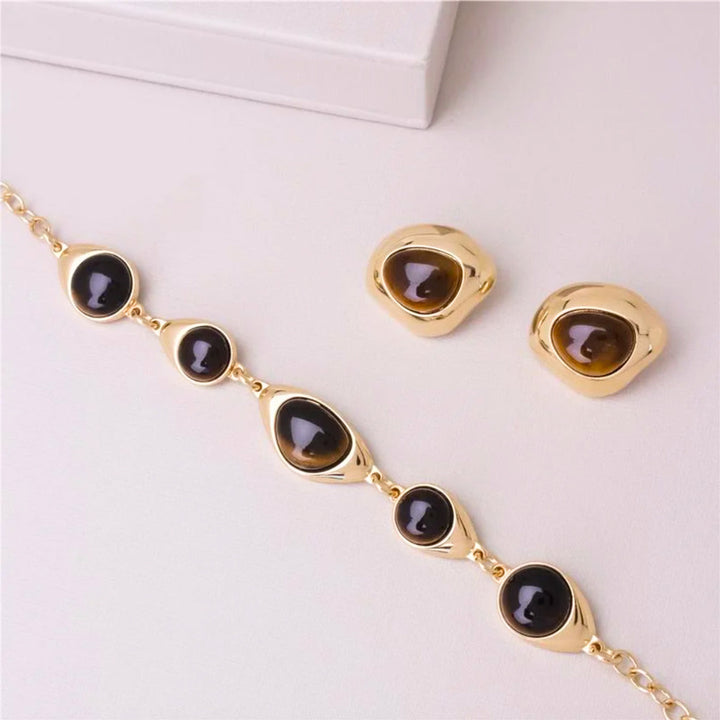 PULSEIRA OLHO DE TIGRE, SODALITA E AGATA PRETA - REVESTIDA A OURO 18K